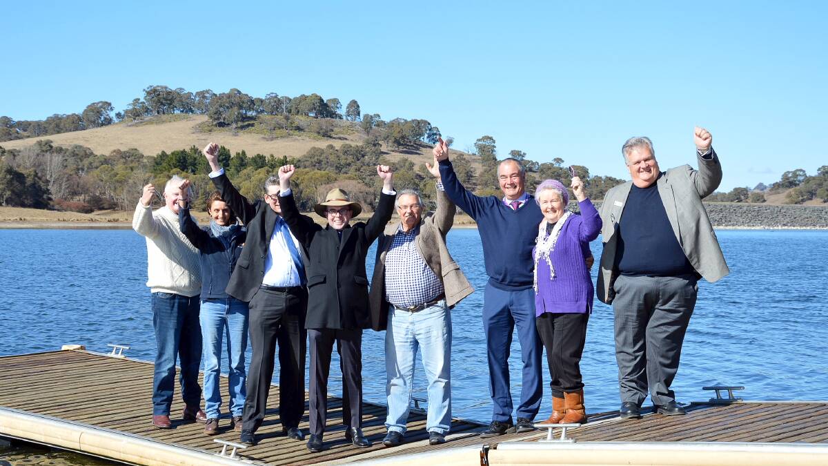 State MP hands over the big cheque locking in Malpas Dam pipeline