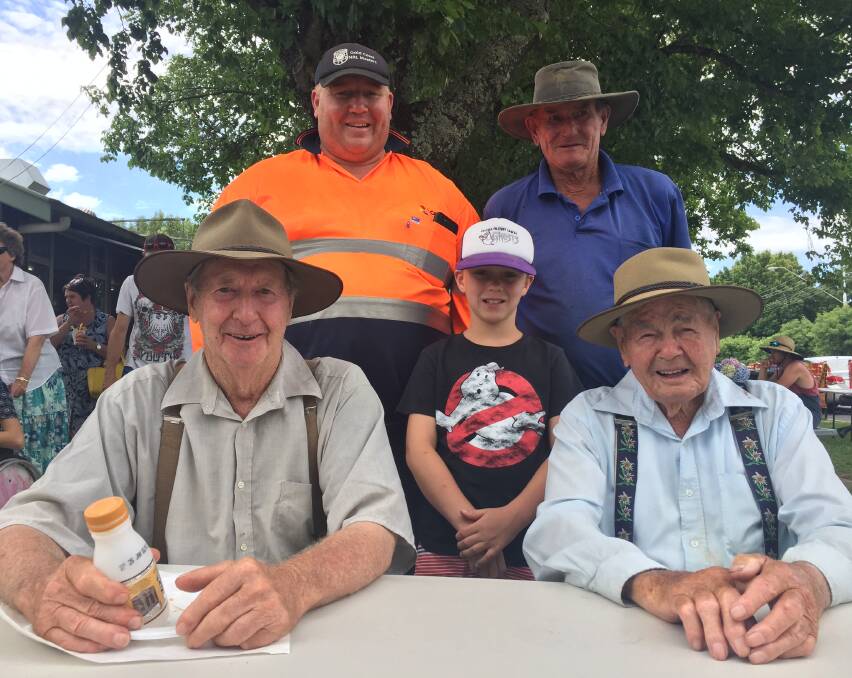 Four generations: Frank Presnell, a founding father of the festival, his son Barry, grandson Peter and great grandson Jason Mowbray, with Charlie Looker (left).
