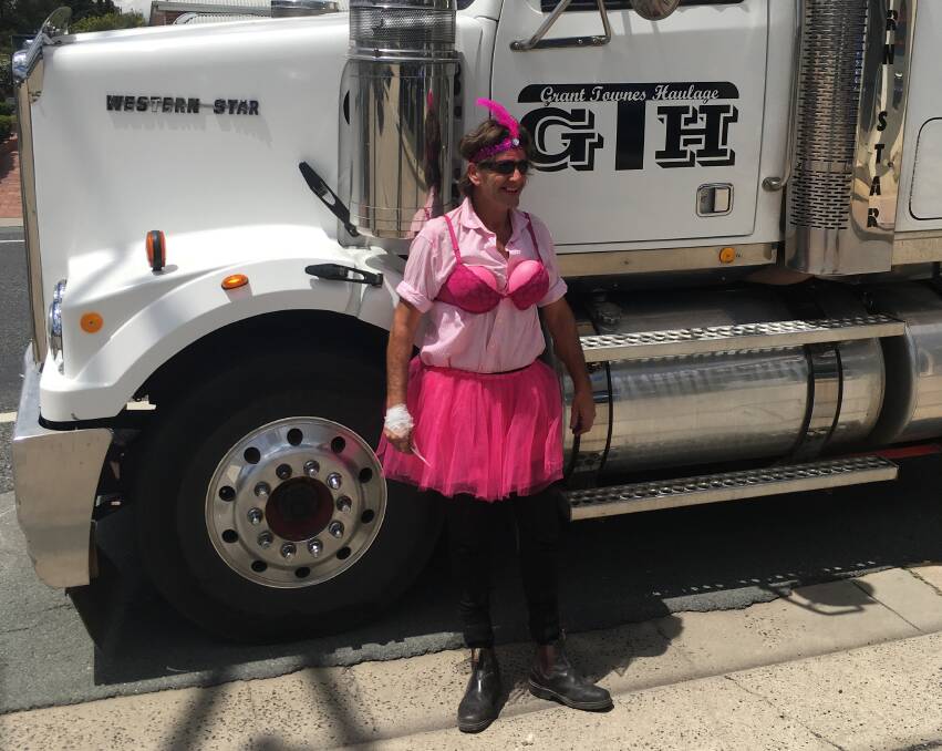Dressed to impress: Local truckie Graham Matley did his run from Tenterfield to Deepwater, Guyra, Inverell and return in a pretty pink outfit in support of charity.
