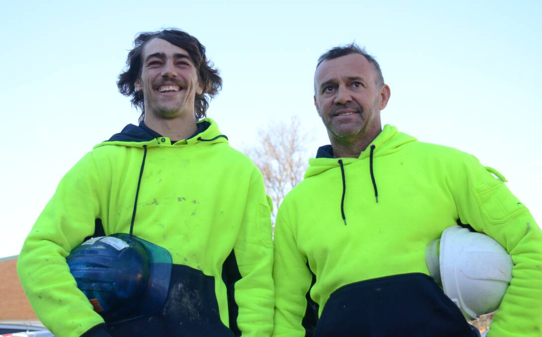 EVERYDAY HEROES: Nelson Bay fishermen Rhys Pateman and his dad Scott pulled seven people from a dramatic double rollover near Armidale earlier this year. Photo: Rachel Baxter