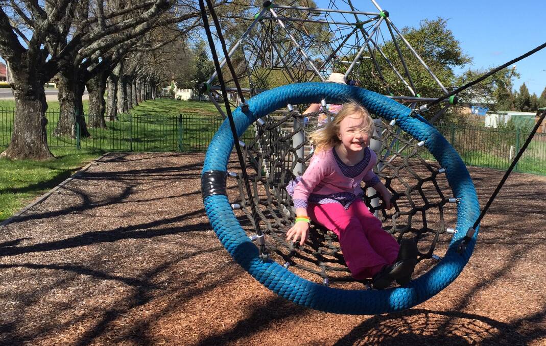 SWINGING TIME: Guyra resident Anja Mcilwain enjoys a swing at the park over the school holidays.