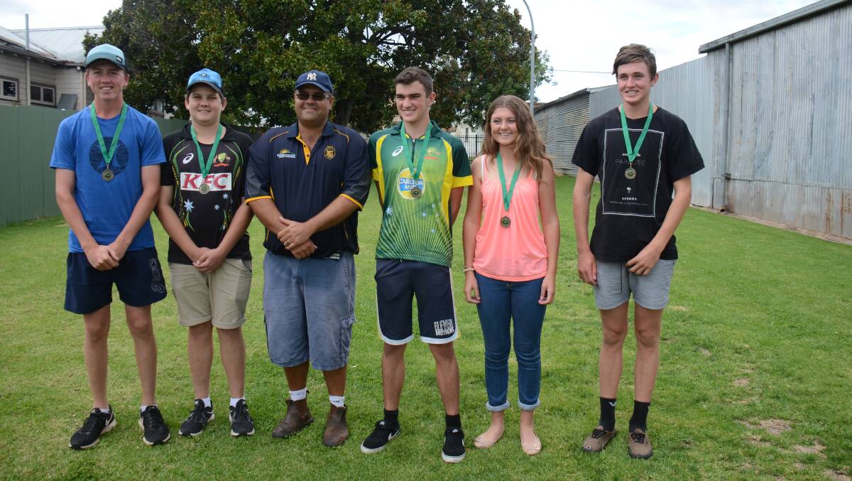 CHAMPION TEAM: Members of Guyra's under 16s cricket team were presented with their premiership medals after taking out the major prize. They were due to play TAS in the grand final on Saturday but it was washed out. 