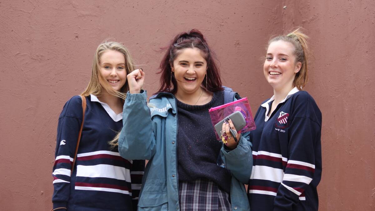 EXAMS UNDERWAY: Armidale High School students Kyah Baller, Heather White and Darcy Edmonds were thrilled to have their first exam done and dusted.