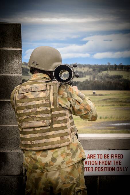 DOWN RANGE: A reservist with the 12/16 Hunter River Lancers prepares for live-fire training using an 84mm anti-armour weapon at Lone Pine Barracks near Singleton.