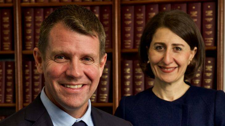 Portrait of NSW State Premier Mike Baird and Treasurer Gladys Berijiklian, the woman shaping up as his successor. Photo: Wolter Peeters