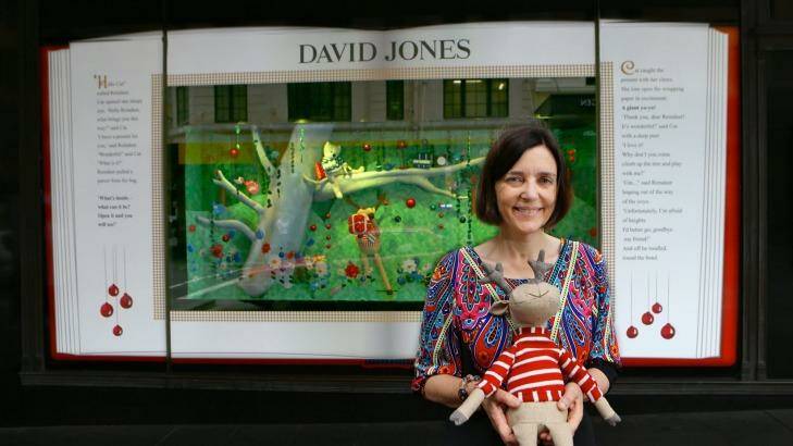 Deer's tale: Sydney children's writer Ursula Dubosarsky with the reindeer that inspired her story told in the David Jones Christmas windows this year. Photo: Dallas Kilponen
