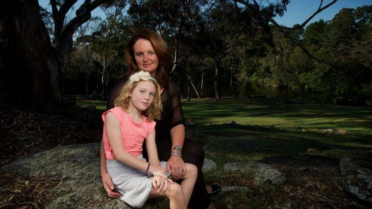 Alisa Kefford Parker with her daughter, Darcy, in Sydney. "This accident was not my fault and it is not right that I am being punished for it." Photo: Wolter Peeters
