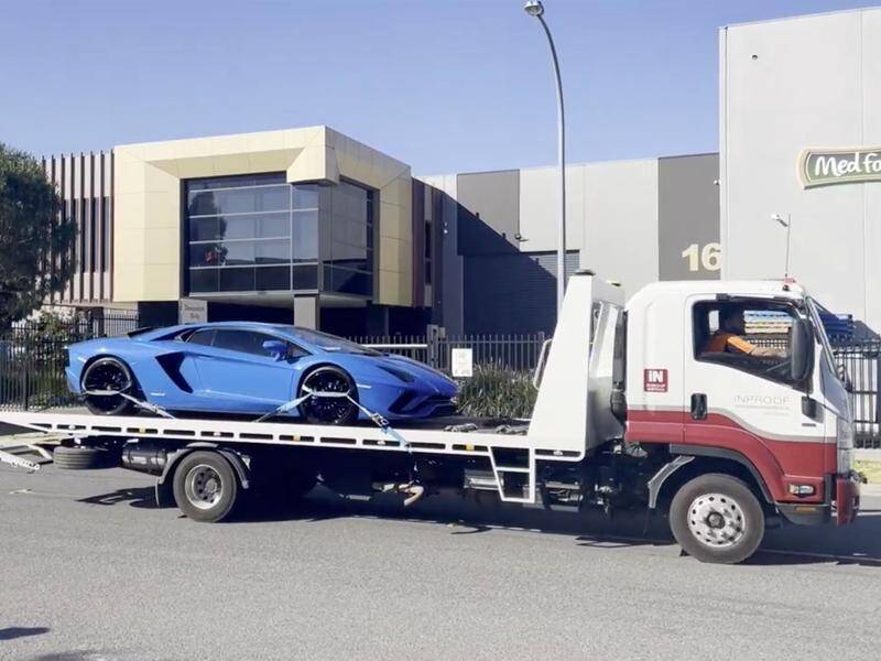 Police have seized luxury cars and cash as part of an investigation into steroid trafficking. (HANDOUT/VICTORIA POLICE)