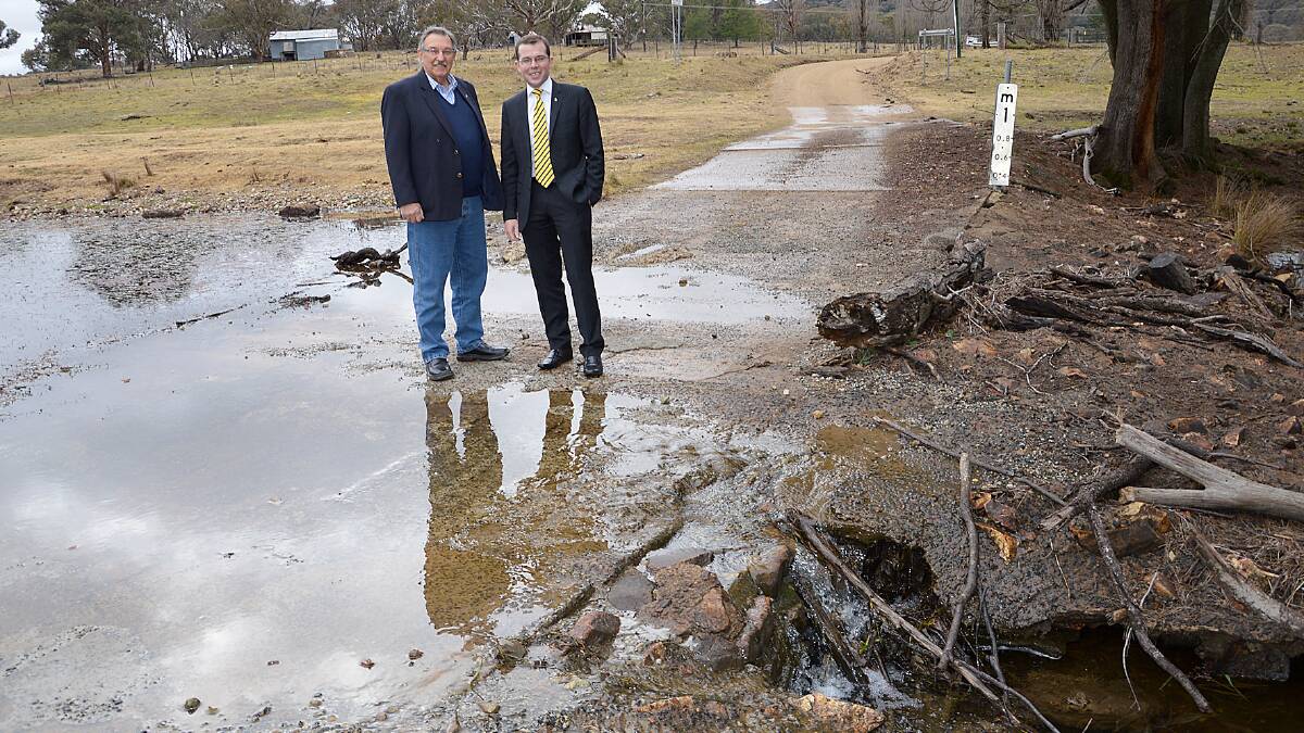  Member for Northern Tablelands Adam Marshall and Guyra Shire Council Mayor Hans Hietbrink at the Laura Creek Crossing on Longford Road, west of Guyra