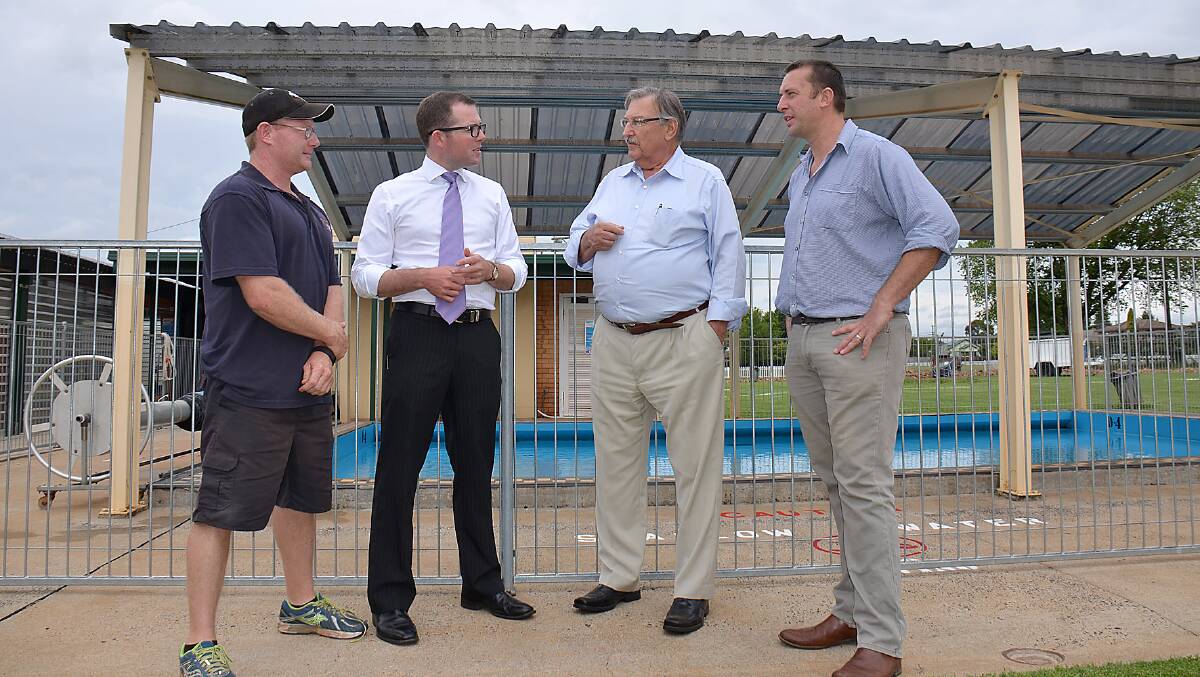 Guyra Aquatic Centre manager Randy Mulligan, left, Northern Tablelands MP Adam Marshall, 
Guyra Shire Mayor Hans Hietbrink and Council’s Director of Planning Karl Bock discussing the pending upgrade works at the Guyra Aquatic Centre.