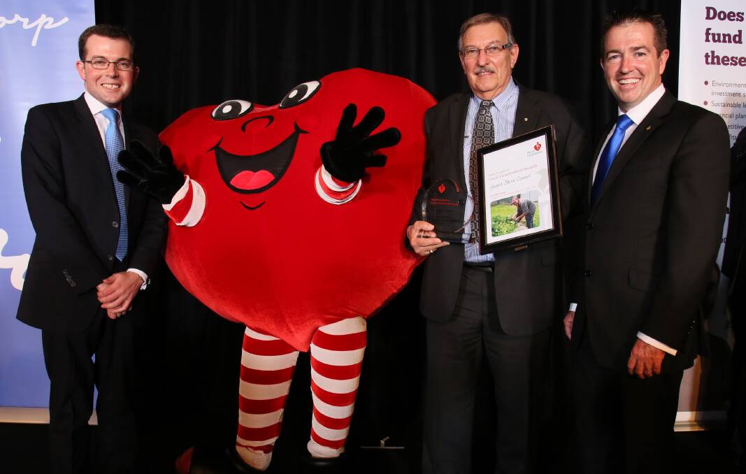Member for Northern Tablelands Adam Marshall, left, pictured with Health Foundation’s ‘Big Heart’, Guyra Shire Council Mayor Hans Hietbrink and Local Government Minister Paul Toole at the awards ceremony 