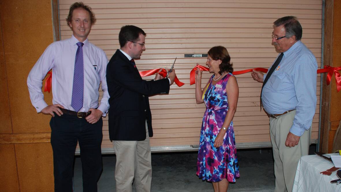  Cutting the ribbon to officially open the new storage area Show Society President Chris Sole, Adam Marshall, Rita Williams and Hans Hietbrink