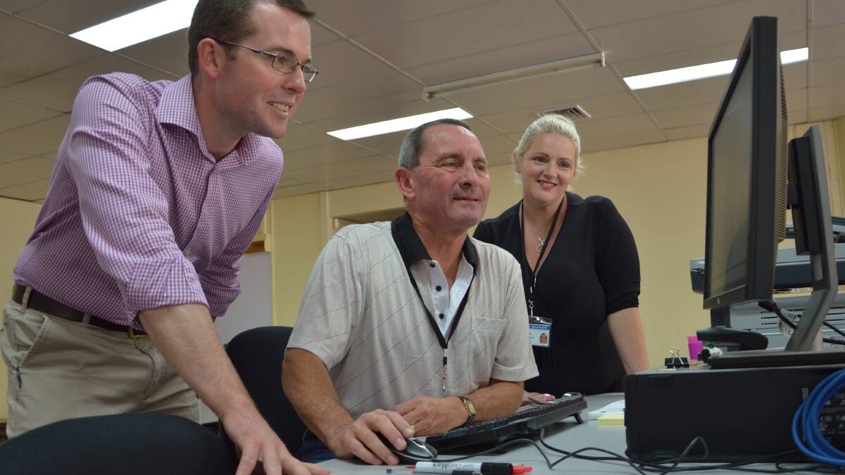 Re-elected Northern Tablelands MP Adam Marshall,
 watches the formal final count take place with NSW Electoral Commission 
Returning Officer Peter Dooley and Office Manager Angel Harris.
