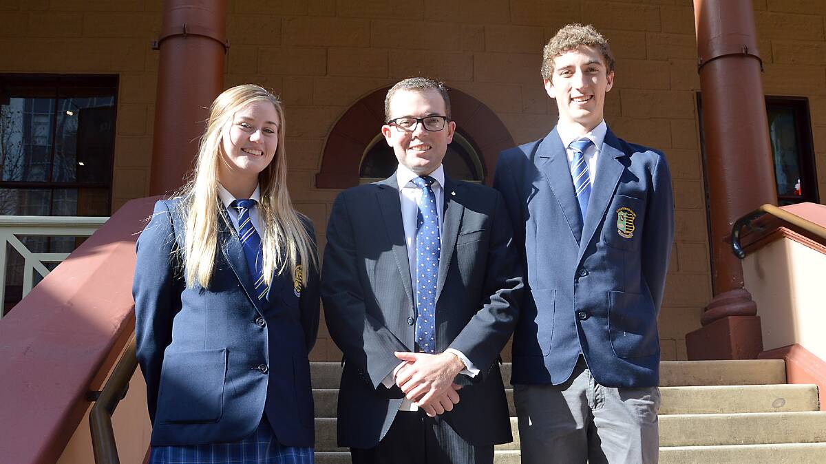 Right: Northern Tablelands MP Adam Marshall pictured on the steps of State Parliament with Guyra Central School captains, Samantha Cox, left, and Austin Youman.