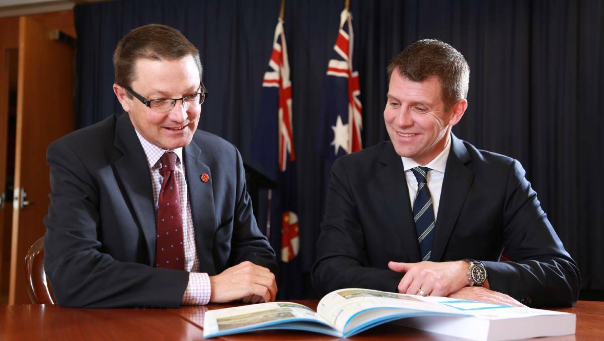 Guyra-based MLC Scot MacDonald with Premier Mike Baird pictured in 2015.