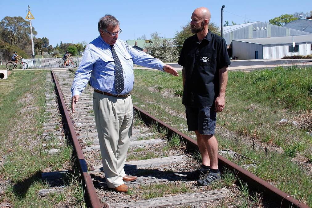 Mayor Hans Hietbrink and Dave Mills discuss a new use for the  railway line between Black Mountain and Ben Lomond 