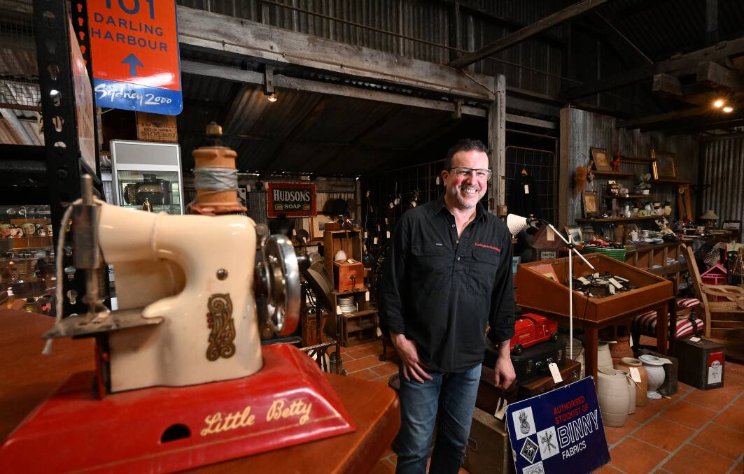 Walcha local Adam Iuston is the owner of the big black building that is overflowing with antiques and second-hand furniture from across the world. Picture by Gareth Gardner