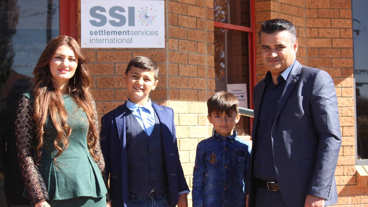 OPEN ARMS: Armidale's Hussein family, who are Yazidi refugees, praised Settlement Services International in supporting them.