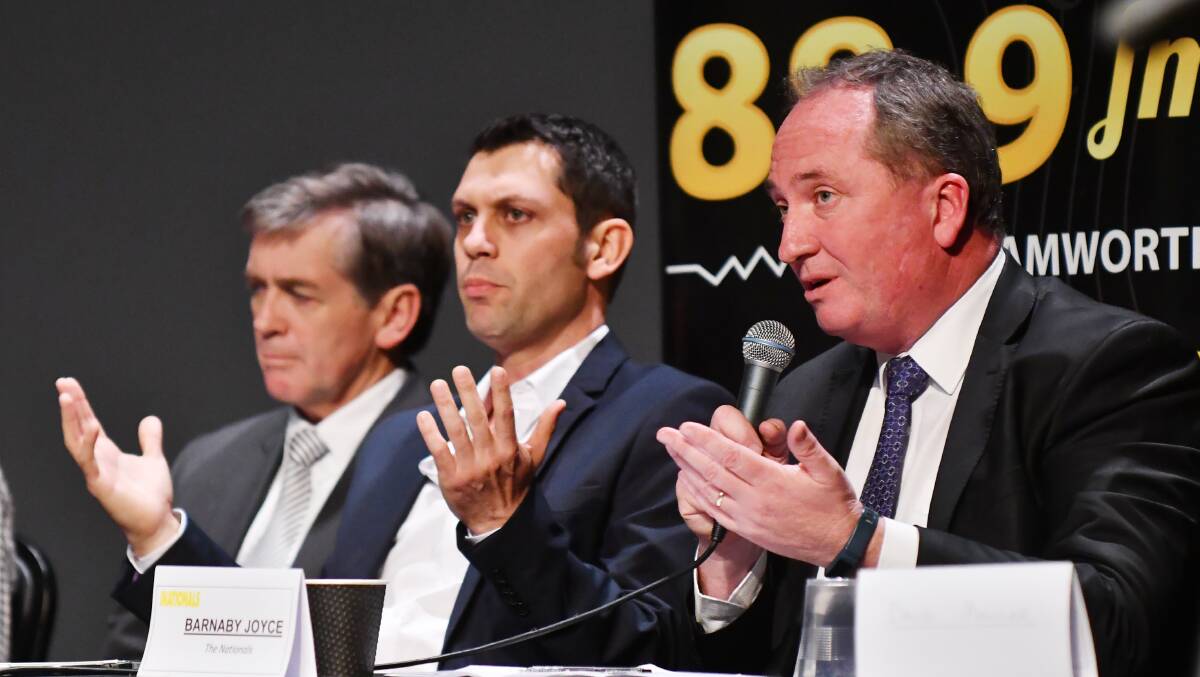 ROUND TWO: Labor candidate David Ewings and Nationals candidate Barnaby Joyce duke it out at a live debate in 2016. Photo: Barry Smith