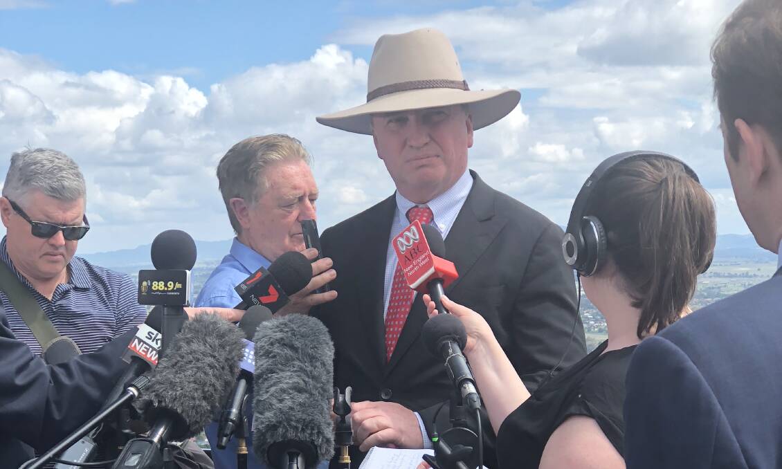 MP NO MORE: Barnaby Joyce at Tamworth Lookout just minutes after he was disqualified from parliament after a High Court ruling on his dual citizenship. Photo: HALEY CRAIG. 