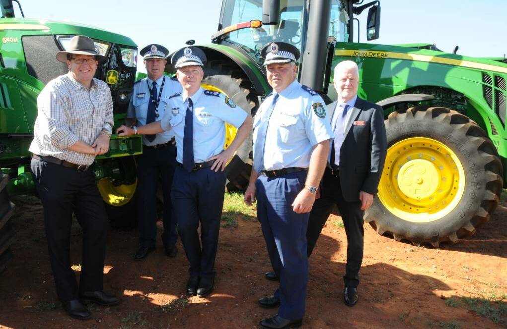 Rural reveal: From left, police minister Troy Grant, Assistant Commissioner Geoff McKechnie, Police Commissioner Mick Fuller, Deputy Commissioner Gary Worboys and Detective Inspector Cameron Whiteside in Dubbo for the announcement on Tuesday. Photo: Paige Williams