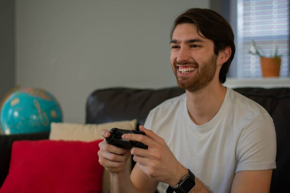 Video games can be social, even if you're alone. Photo by Alex Carmichael on Unsplash.