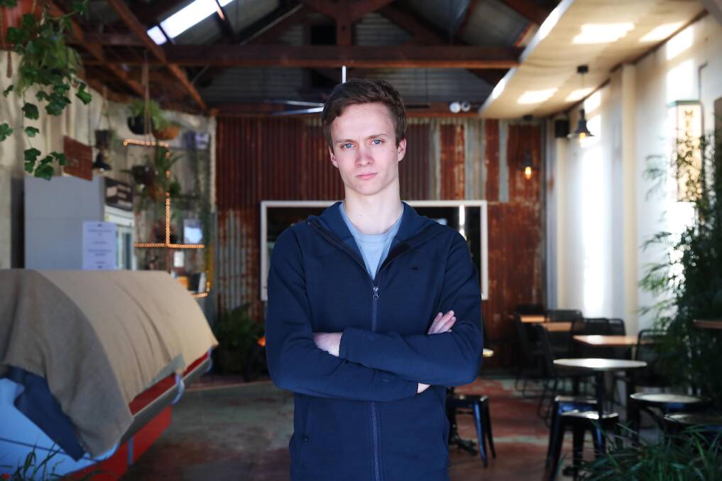 BEYOND THE GATES: Calvin Combs finished school last year and has embarked on a gap year in "the real world" to gather the skills he didn't learn while studying to receive his above-average ATAR. Picture: Emma Hillier