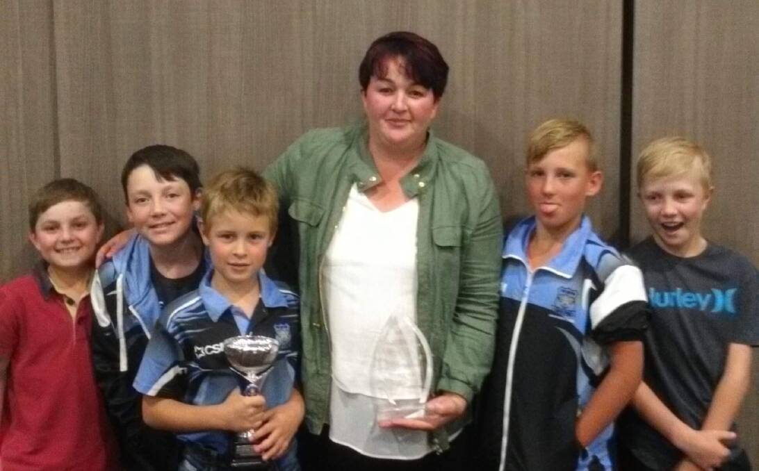 HUGE FEAT: Gina Lockyer and members of the Guyra under 10s rugby league side at the New England Sports Awards. Photo: Supplied