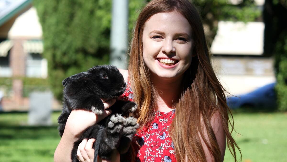 I FELL IN LOVE WITH HIM: Hannah Fisher with Obi-Bun Kenobi, the pet rabbit she has owned for almost a year. Picture: Madeline Link