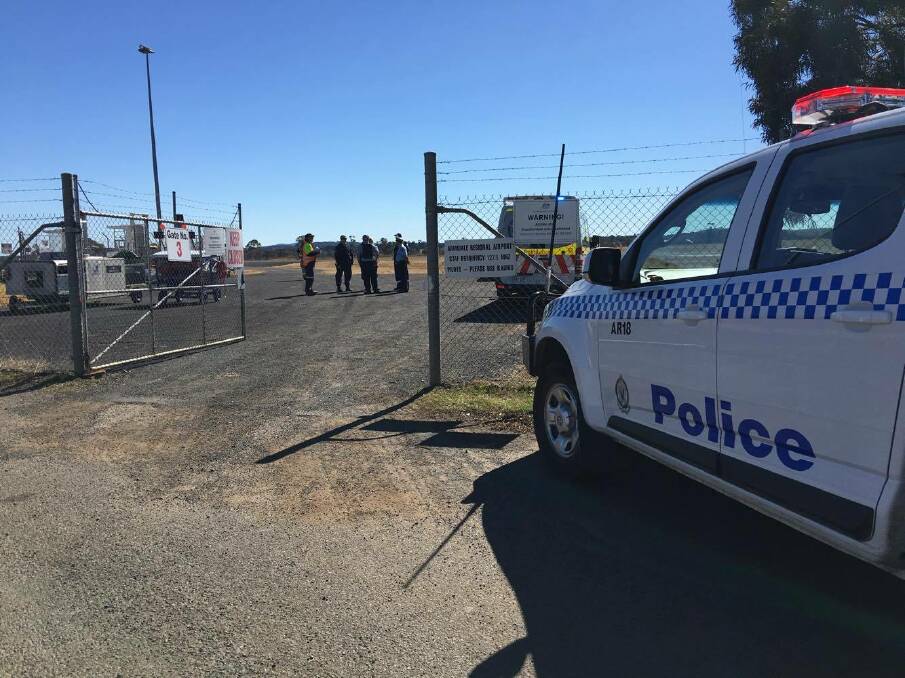 ELECTRICAL FAILURE: Emergency crews responding to an emergency landing at Armidale Regional Airport on Wednesday afternoon. Photo: Matt Bedford.