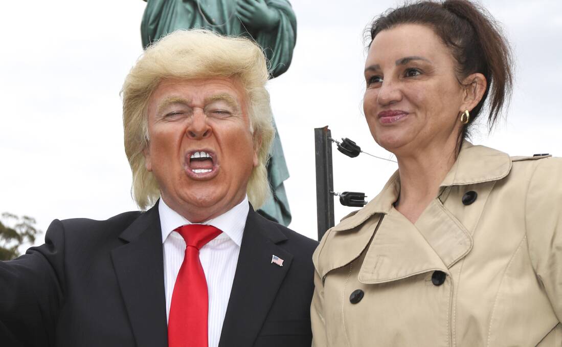 Senator Jacqui Lambie poses with a Donald Trump impersonator at Tasmazia in 2017.