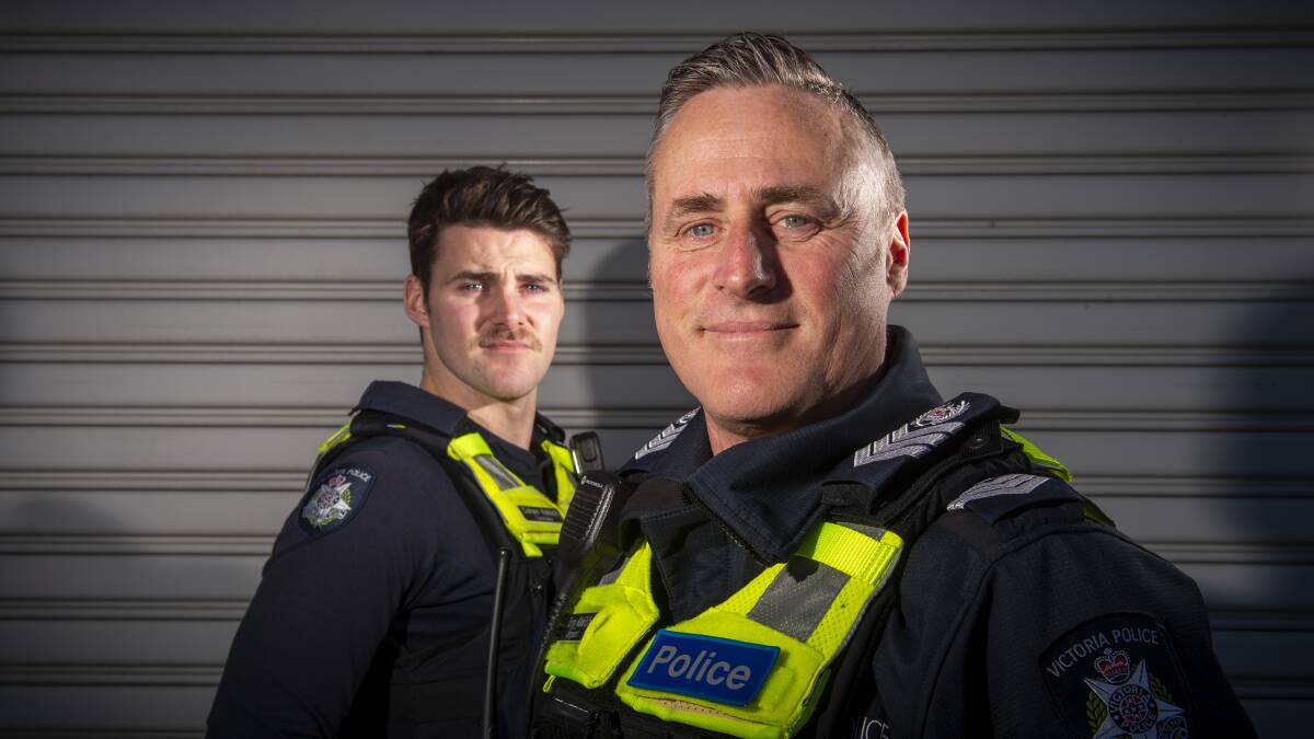 Cohen and Tony Kekich prepare to patrol the streets of Bendigo. Cohen became a police officer several months ago and is following in the footsteps of his father Tony. Picture: Darren Howe 