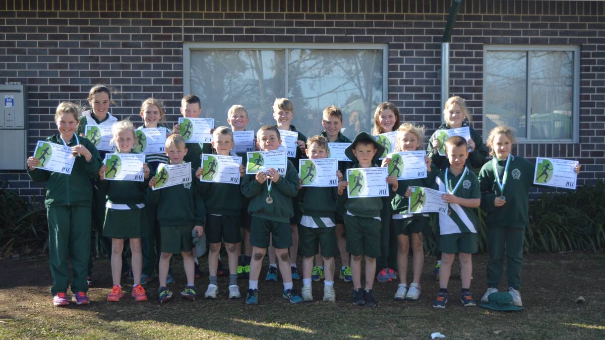 SPEEDING AWAY: Age champions and runners up were rewarded for their efforts at the school's annual athletics carnival. 