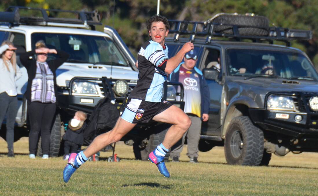 READY TO FIRE: Brad Waters races away in the Spuds match against Tenterfield last month. 