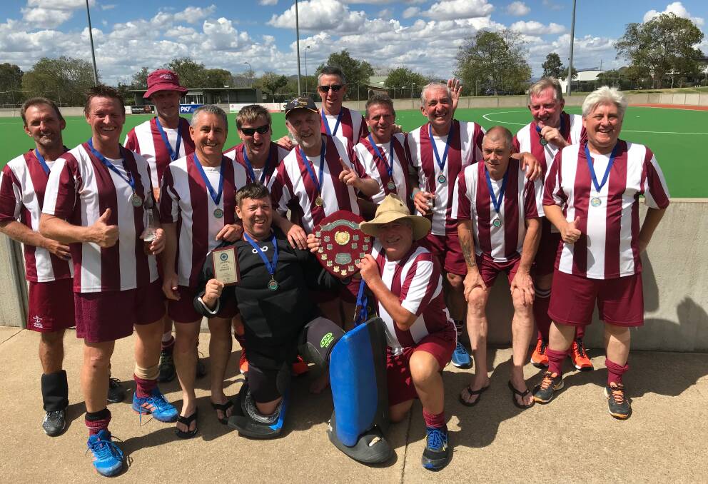 Champions: After enduring years of finals disappointment Inverell celebrate their Over 55's state championship C Division triumph.