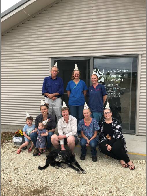 VETS: The staff at the Guyra District Veterinary Services. Front row: Dr Ainslie Lund and children Sam and Grace, Dr Leisa Brown, Amy Tarrant, Tanya Lafford-Raper. Back: Nigel Scott, Nicola Robinson, Bec Bennett. Absent: Jo Ward and Tracy Gowen.