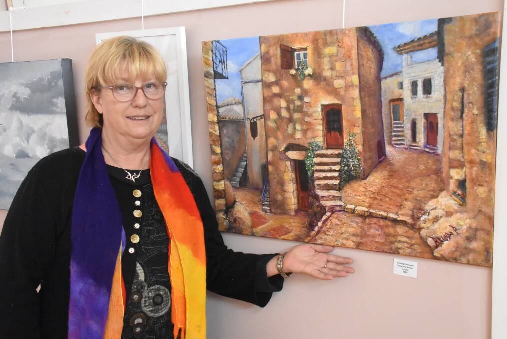 ARTIST: Belinda Parkinson, of Llangothlin, with her acrylic "Steps and Stones", based on a French streetscape in a calendar. Photo: Nicholas Fuller