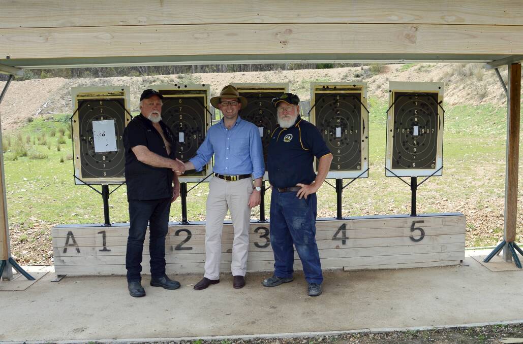 BULLSEYE: Northern Tablelands MP Adam Marshall (centre) congratulates Rangers Hunting and Shooting Club President Geoff Mackay (left) and Emmaville Rife Range Committee Secretary Evan Brown (right) on securing a $45,000 State Government grant.