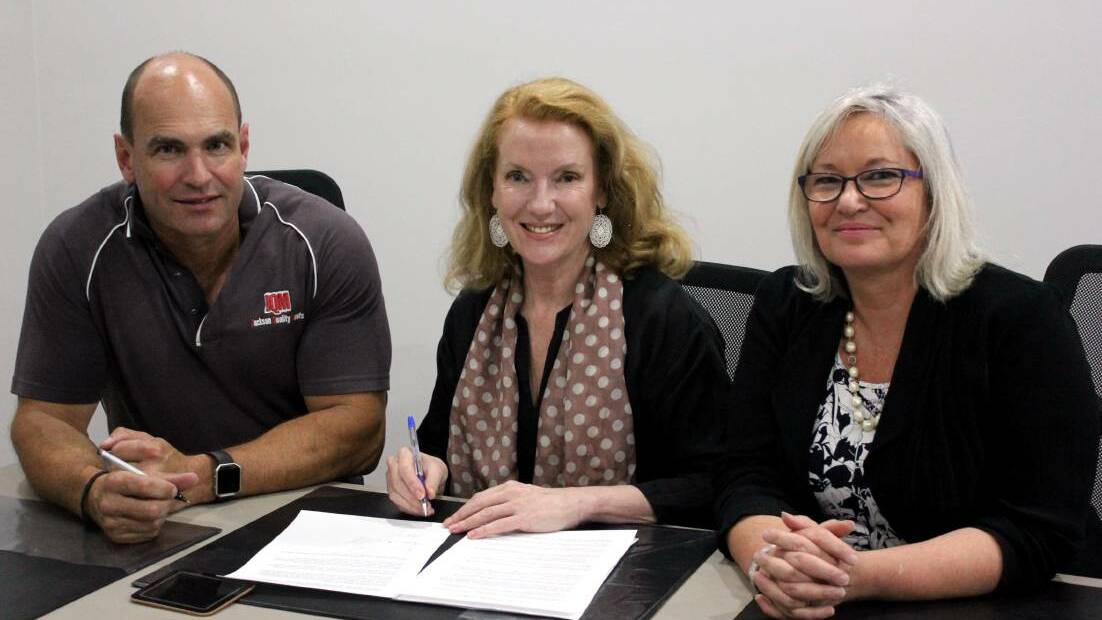 Aileen MacDonald forming the Armidale Guyra Business Alliance with Locals4Locals president Greg Jackson and Armidale Business Chamber president Susan Cull. Photo: Madeline Link