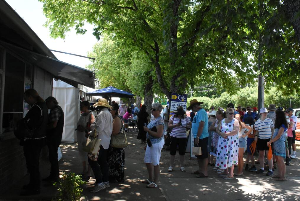 The long lunchtime queue at the food gazebo. Photo: Nicholas Fuller