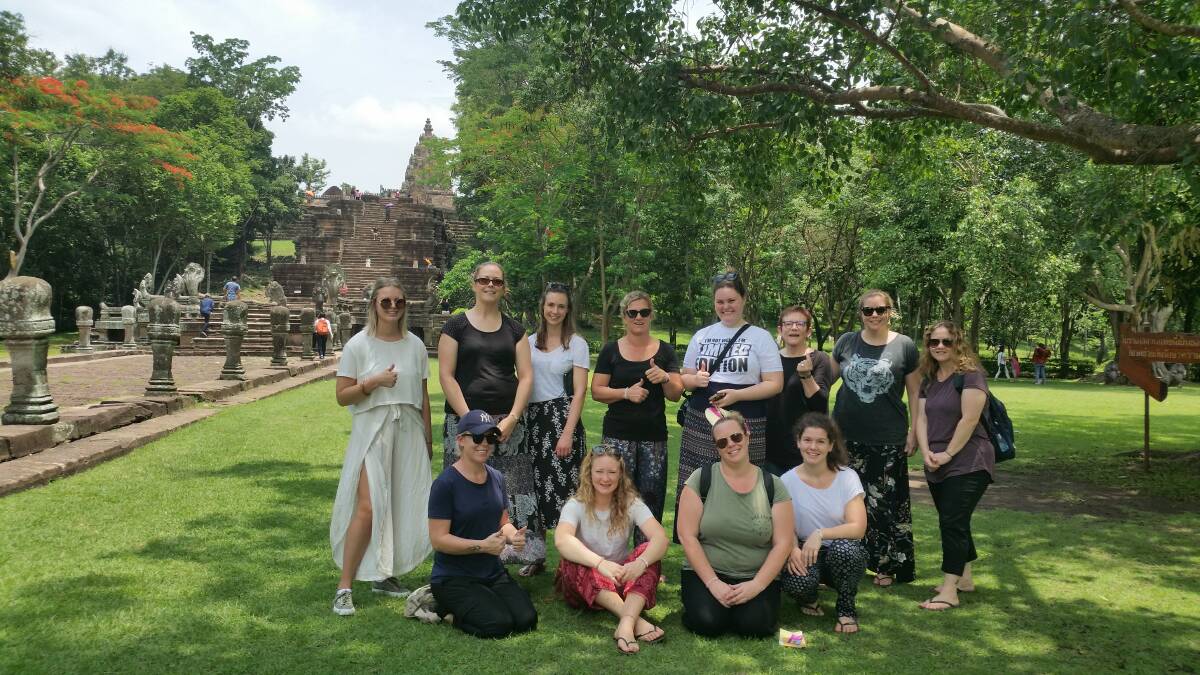 OVERSEAS STUDENTS: Kate McNeill (kneeling front left) and fellow students on location in Thailand.