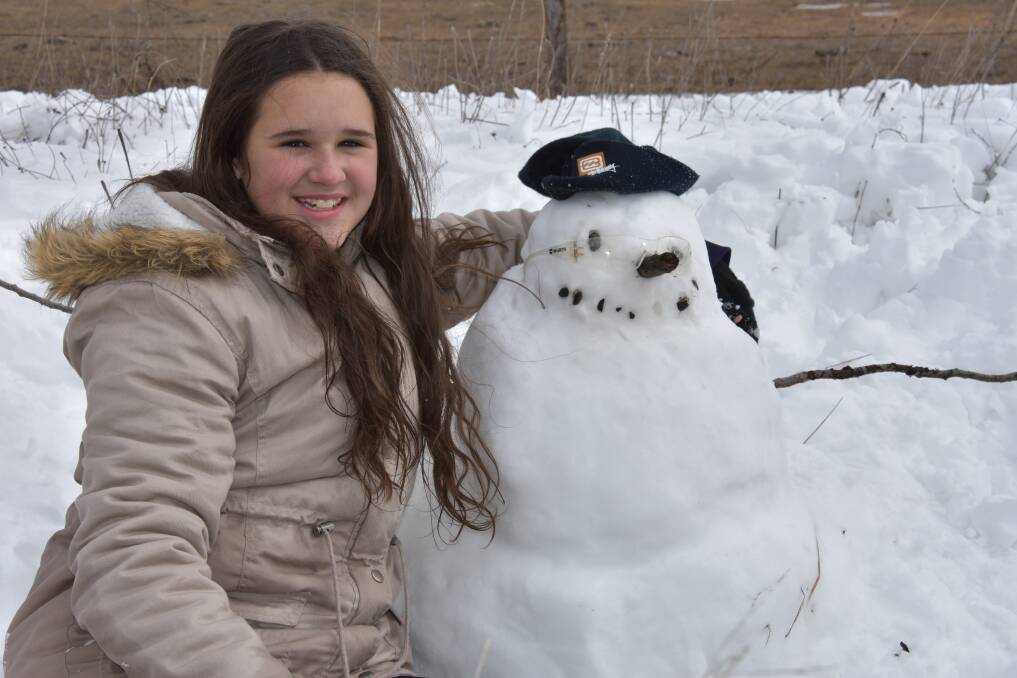 FUN IN THE SNOW: Nikita Russell, from Dalby, and friend. Photo: Nicholas Fuller