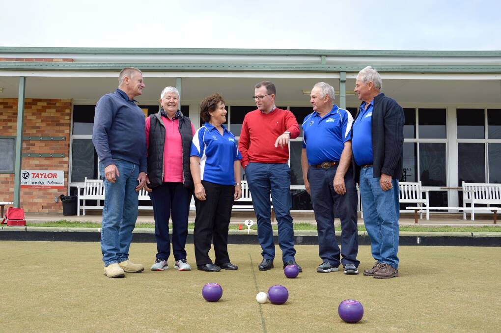 Glen Innes Bowling Club President Robert Lewis, left, Men's Club Secretary Sandra Orvad, Club Director Shirley Hutton, Northern Tablelands MP Adam Marshall, Club Director Peter Hutton, and Club Director Col Baker in front of the clubhouse.