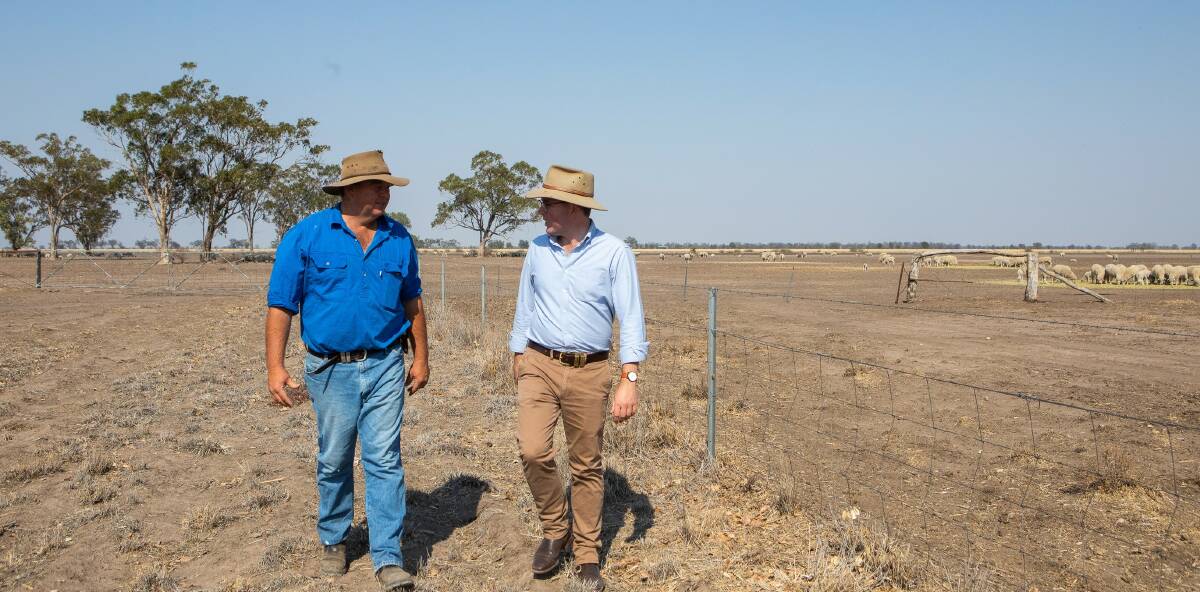 Northern Tablelands MP and Agriculture Minister Adam Marshall (right) with Moree farmer Dan Reardon, one of 144,000 farmers across NSW whose Local Lands Services rates will be waived again this year due to drought and bushfires.