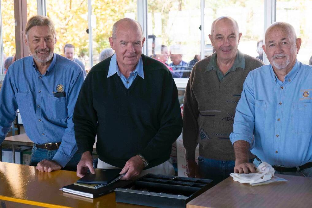 RELAXED WORKERS awaiting the first customers at last year's Fair. Photo: Rotary Club of Armidale Central