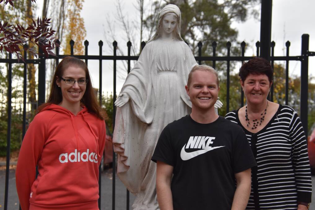 CELEBRATING: St Mary of the Angels Guyra turns 100 this year; principal Sharon Wittig (right) and teachers Tiffany Martin and Matthew Frizell are organising a birthday bash in June. Photo: Nicholas Fuller