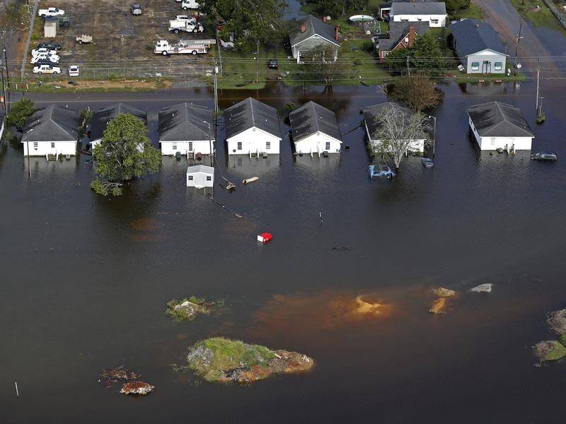 Floodwaters from hurricane Florence continue to rise as authorities try to rescue trapped residents.