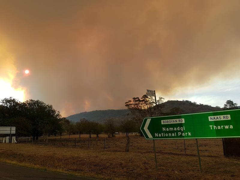 An emergency-level fire in Namadgi National Park was heading northeast towards Tharwa in Canberra.