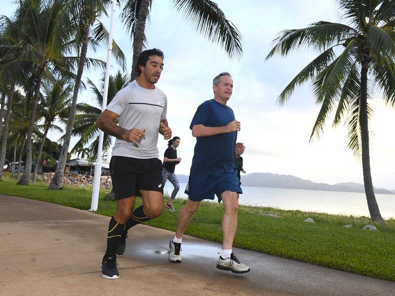 Rugby league star Johnathan Thurston joined Bill Shorten for an early morning run.