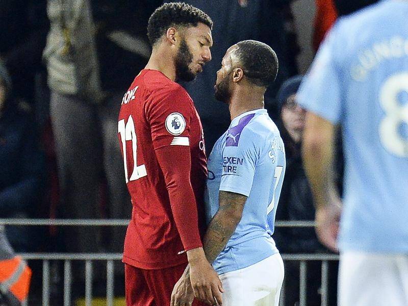 Liverpool's Joe Gomez (l) and Manchester City's Raheem Sterling had a run-in during their EPL game.